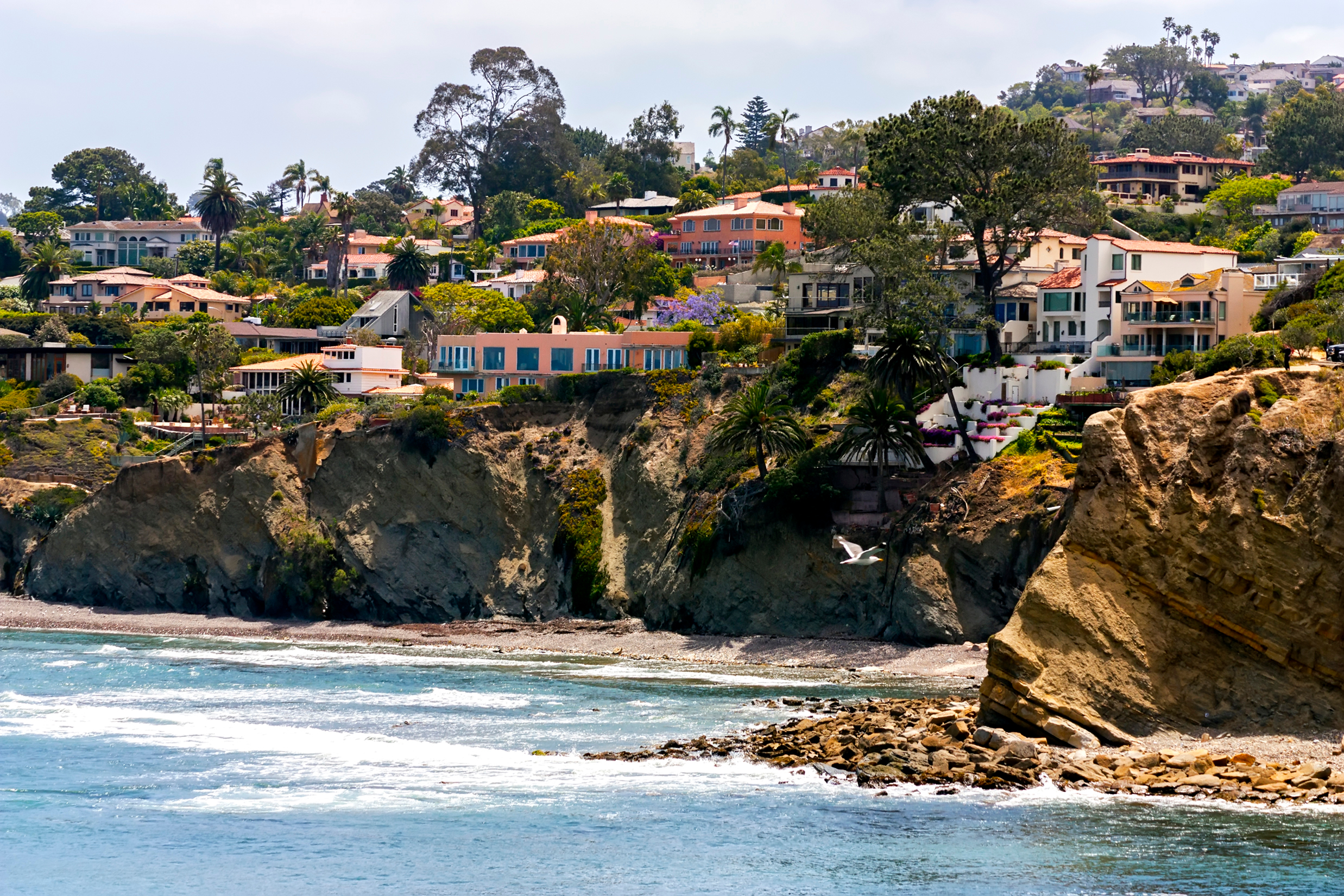 View of Homes Along the Ocean in the La Jolla, CA neighborhood of Coastal San Diego County