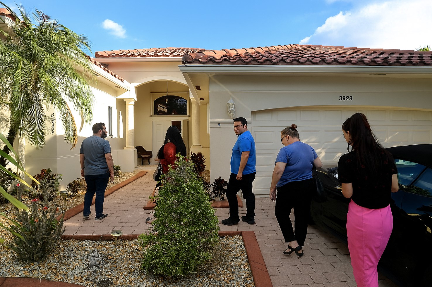 Homebuyers touring a San Diego property signal the return of seller incentives and increased buyer leverage in the real estate market
