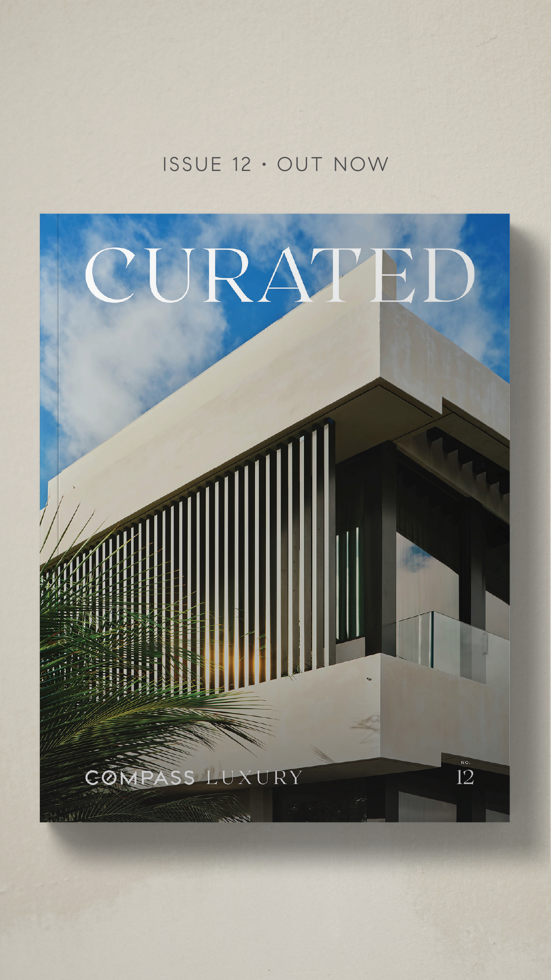 Cover of Compass Luxury “Curated” magazine Issue 12 for Spring/Summer 2026, showing modern architecture with clean white geometric lines and vertical sun-slats against a bright blue sky, with headline text “ISSUE 12 · OUT NOW.” Presented by Portia Green, REALTOR® at Compass.